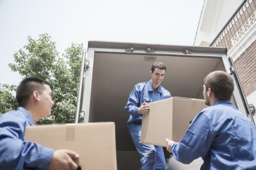 Professional movers loading a truck in Aldershot