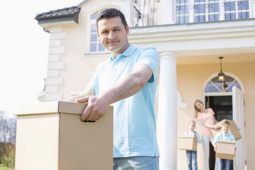 Professional packers securing items for a move