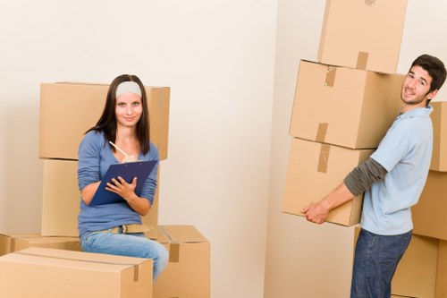 Satisfied customers interacting with a Reading removal company's staff